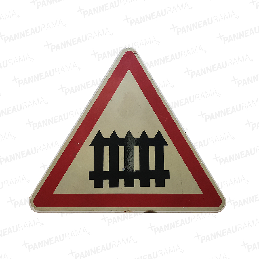 Passage à niveau muni de barrières